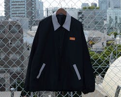 UO PRO ロゴコーチジャケット ブラック S